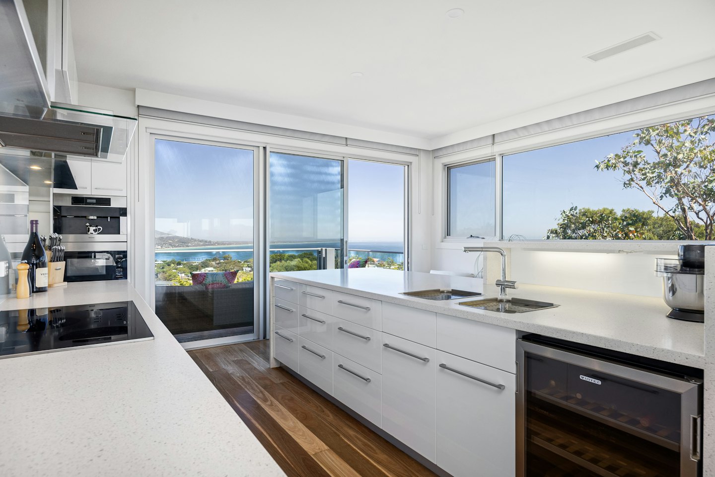 Modern kitchen with appliances and views of the bay.
